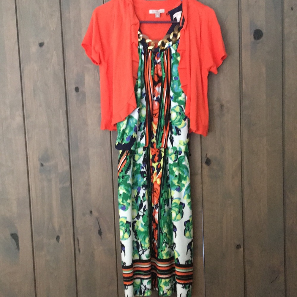 Multi colored sleeveless dress with decorative neckline and matching sweater